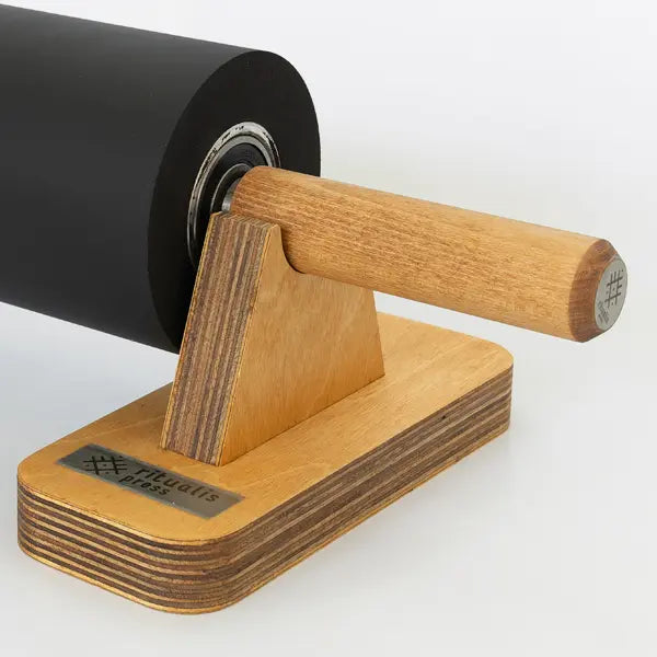 Wooden stand as a gift for each product named Lino Pin Roller made by Ritualis Press